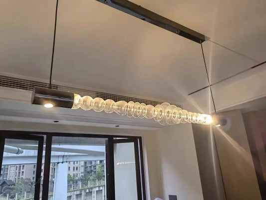 Kornephoros Glass Accent Linear Pendant Lamp